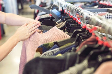 Soft knitwear on a clothing rail